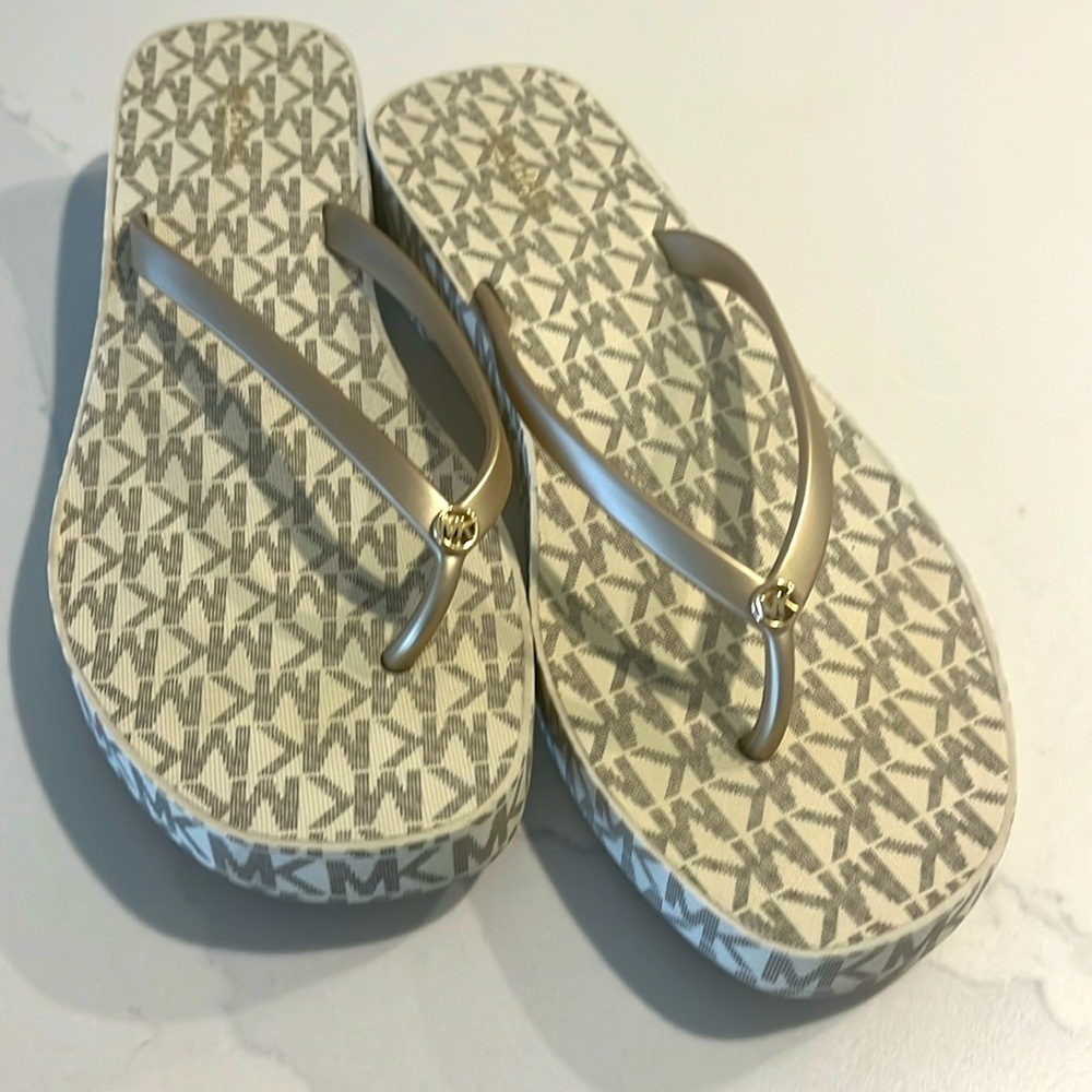 Eva - Michael Kors -  Women’s size 9 gold Logo Wedge Flip Flops